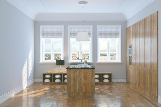 Kuchnia otwarta na salon wykończona drewnem – minimalizm i natura w aranżacji kuchni